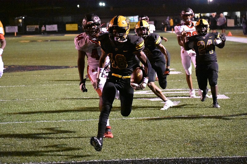 Watson Chapel running back K.J. Ferguson rushes into the end zone for a touchdown against Jacksonville in the first quarter Friday at Wildcat Stadium. (Pine Bluff Commercial/I.C. Murrell)