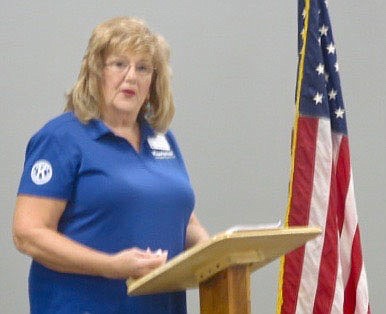 Westside Eagle Observer/SUSAN HOLLAND
Carla O'Brien, Kiwanis Club MoArk District Governor for 2021-2022, speaks to members and guests of the Gravette Kiwanis Club at their meeting Friday, Oct. 1. O'Brien outlined her plans for MoArk District in the coming year and shared her goals, her governor's project and the motto she has selected, "We Are Family."