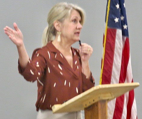 Westside Eagle Observer/SUSAN HOLLAND
Lori Tudor, director of the Arkansas Department of Transportation, gestures as she speaks to citizens assembled at the Gravette Civic Center Friday morning, Oct. 1. Tudor was guest speaker at the regular meeting of the Gravette Kiwanis Club and drew a large crowd who came to hear her comments about the department's Western North-South Connector Study now being conducted.