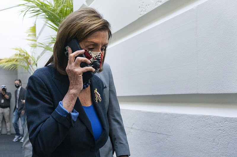 House Speaker Nancy Pelosi of Calif., arrives for a meeting with House Democrats, Friday, Oct. 1, 2021, on Capitol Hill in Washington. (AP Photo/Jacquelyn Martin)