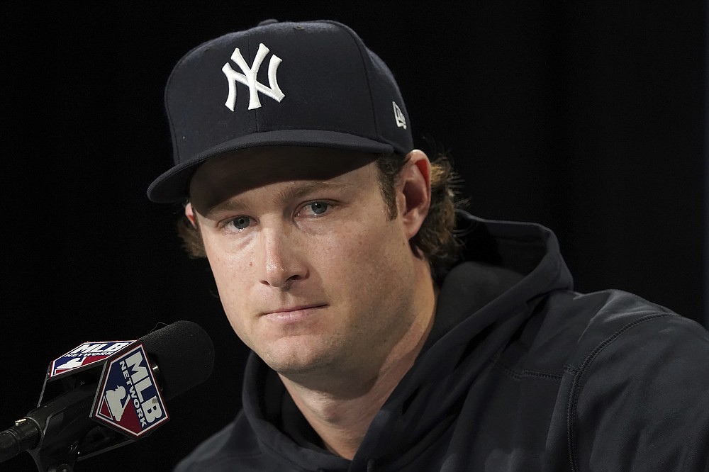 New York Yankees starting pitcher Gerrit Cole listens to a question during a news conference at the American League Wild Card Workout Day at Fenway Park, Monday, Oct. 4, 2021, before Tuesday's American League Wild Card game against the Boston Red Sox in Boston. (AP Photo/Mary Schwalm)