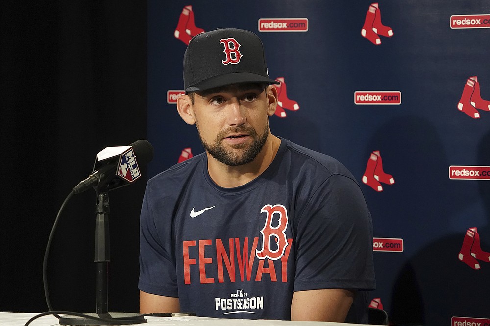 Boston Red Sox starting pitcher Nathan Eovaldi listens to a question during a news conference at the American League Wild Card Workout Day at Fenway Park, Monday, Oct. 4, 2021, before Tuesday's American League Wild Card game against the New York Yankees in Boston. (AP Photo/Mary Schwalm)