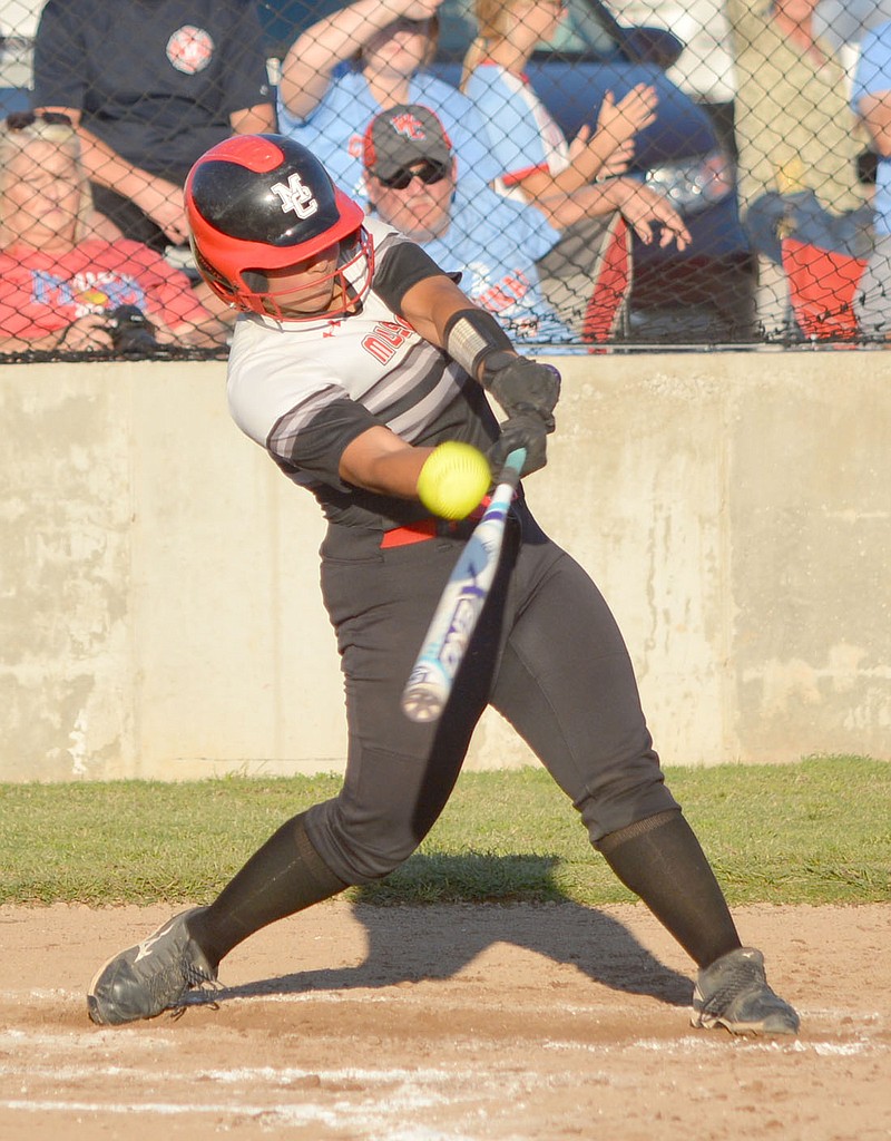 Al Gaspeny/Special to McDonald County Pres
McDonald County&#x201a;&#xc4;&#xf4;s Mariana Salas hits a bloop single against Webb City on Monday at Lady Mustang Softball Field. Earlier in the game, Salas smacked a three-run homer to center. She finished 3-for-3 with three RBI.