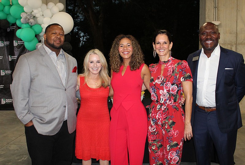 Darryl Spinks (from left), Kerry Robinson, Sonia Spinks, Laura Rush and Joseph Obiti help support Big Brothers Big Sisters of Northwest Arkansas at the Big Event benefit Sept. 30 at Heroncrest in Cave Springs.
(NWA Democrat-Gazette/Carin Schoppmeyer)