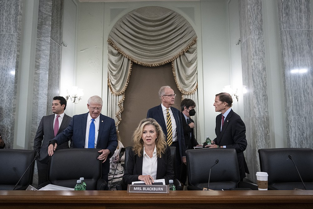 Sen. Roger Wicker, R-Miss., Sen. Marsha Blackburn, R-Tenn., Sen. Jerry Moran, R-Kan., and Sen. Richard Blumenthal, D-Conn., arrive for a Senate Committee on Commerce, Science, and Transportation hearing on Capitol Hill on Tuesday, Oct. 5, 2021, in Washington. (Drew Angerer/Pool via AP)