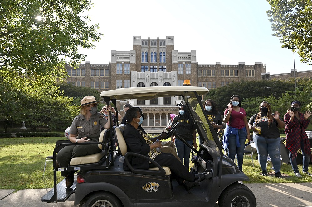 Elizabeth Eckford celebrates her 80th birthday party outside Central High School driving by as students sang Happy Birthday and LeRon McAdoo sang a rendition of "Amazing Grace," Monday, Oct. 4, 2021, in Little Rock, Ark. Central High became internationally known in 1957 during the desegregation crisis. Eckford and eight other Black students were barred from entering the school by Arkansas National Guard members who had been activated, despite a court-approved desegregation plan. (Stephen Swofford/The Arkansas Democrat-Gazette via AP)
