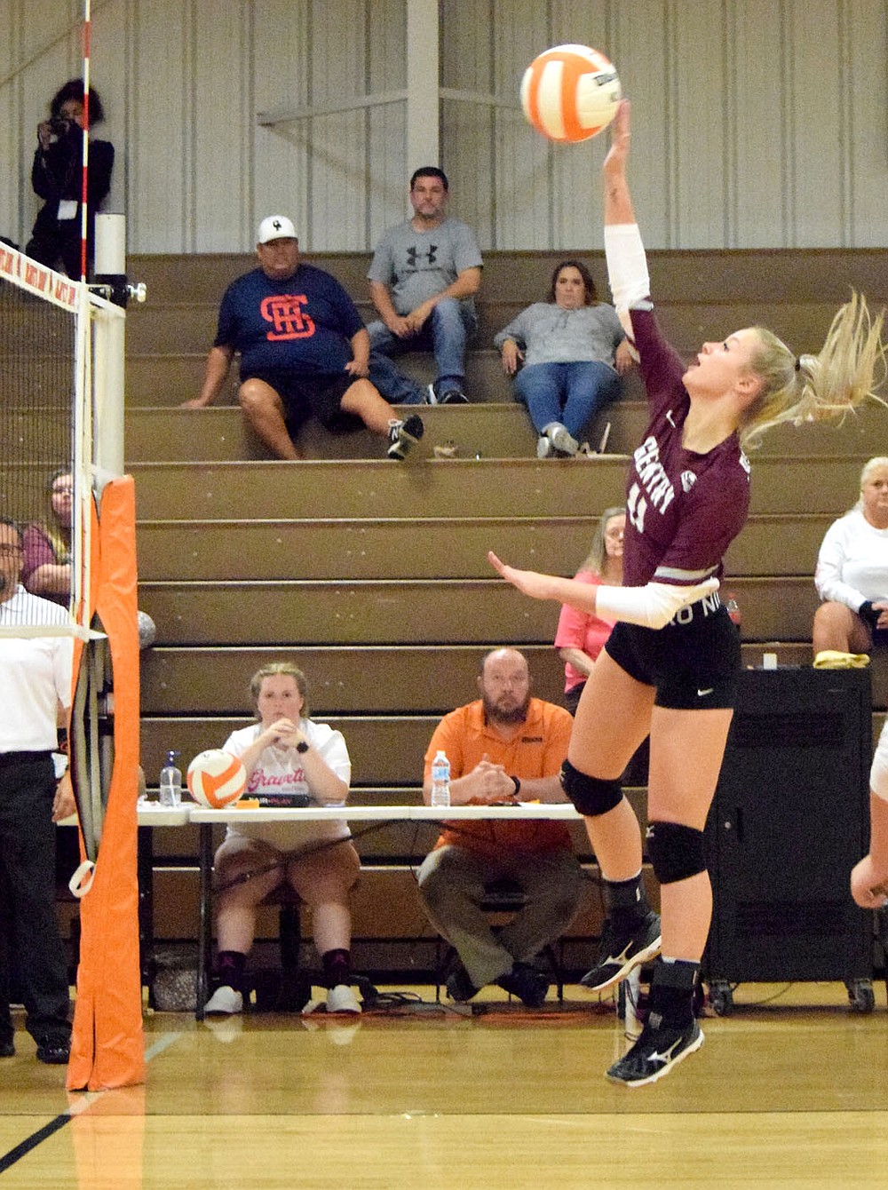 Westside Eagle Observer/MIKE ECKELS
Lady Pioneer Liberty Brannon hits the ball back over the net into the Lady Lions side of the court during the Gravette-Gentry varsity volleyball match at the Competition Gym in Gravette Thursday night. The Lady Lions took the senior night contest in three sets, 25-16, 25-21, 25-15 over the Lady Pioneers.