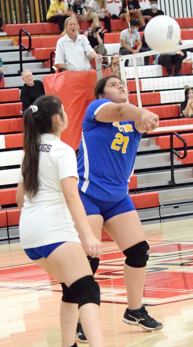 Westside Eagle Observer/MIKE ECKELS
Using a forearm hit, Anette Hernandez (Decatur 27) sends the ball back over the net to the Lady Highlander side of the court during the second set of the Eureka Springs-Decatur varsity volleyball match at Highlander Gym in Eureka Springs Oct. 5. The Lady Bulldogs fell to the Lady Highlanders in straight sets.