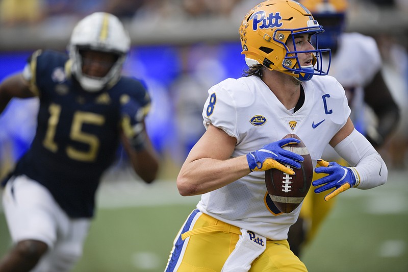 Pittsburgh quarterback Kenny Pickett (8) celebrates with head coach Pat  Narduzzi after scoring a touchdown in the second half of an NCAA college  football game, Friday, Nov. 24, 2017, in Pittsburgh. Pittsburgh