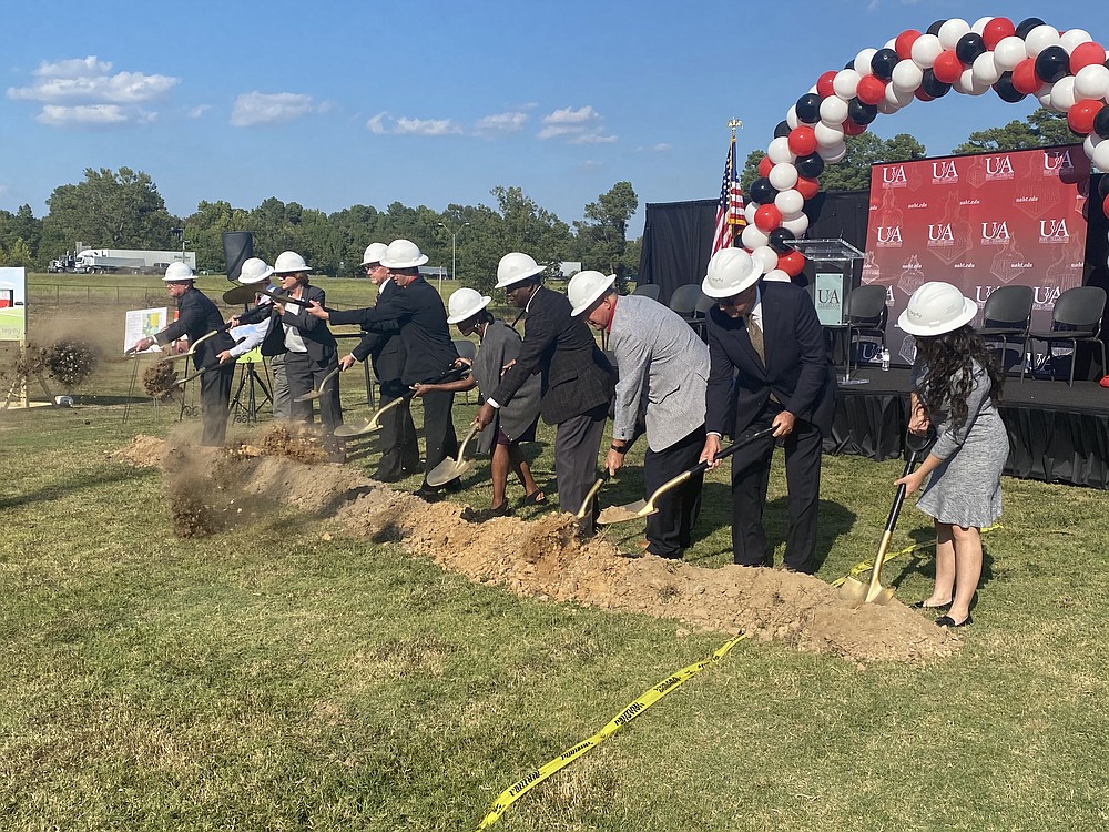 Members of UAHT, the University of Arkansas System and the city of Texarkana join for the ceremonial groundbreaking of UAHT's new $3.85 million facility.
(Staff photo by Andrew Bell)