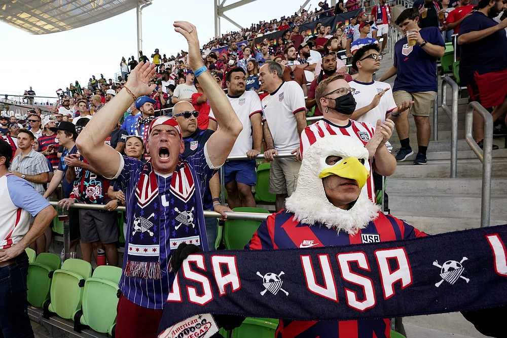 Fans cheer during a FIFA World Cup qualifying soccer match between Jamaica and the United States, Thursday, Oct. 7, 2021, in Austin, Texas. (AP Photo/Eric Gay)