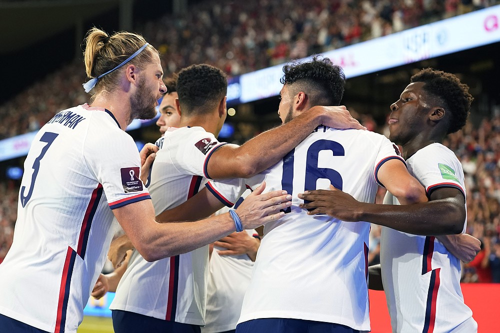 United States' Matthew Hoppe (19) celebrates with teammates after the team scored against Jamaica during a FIFA World Cup qualifying soccer match Thursday, Oct. 7, 2021, in Austin, Texas. (AP Photo/Eric Gay)