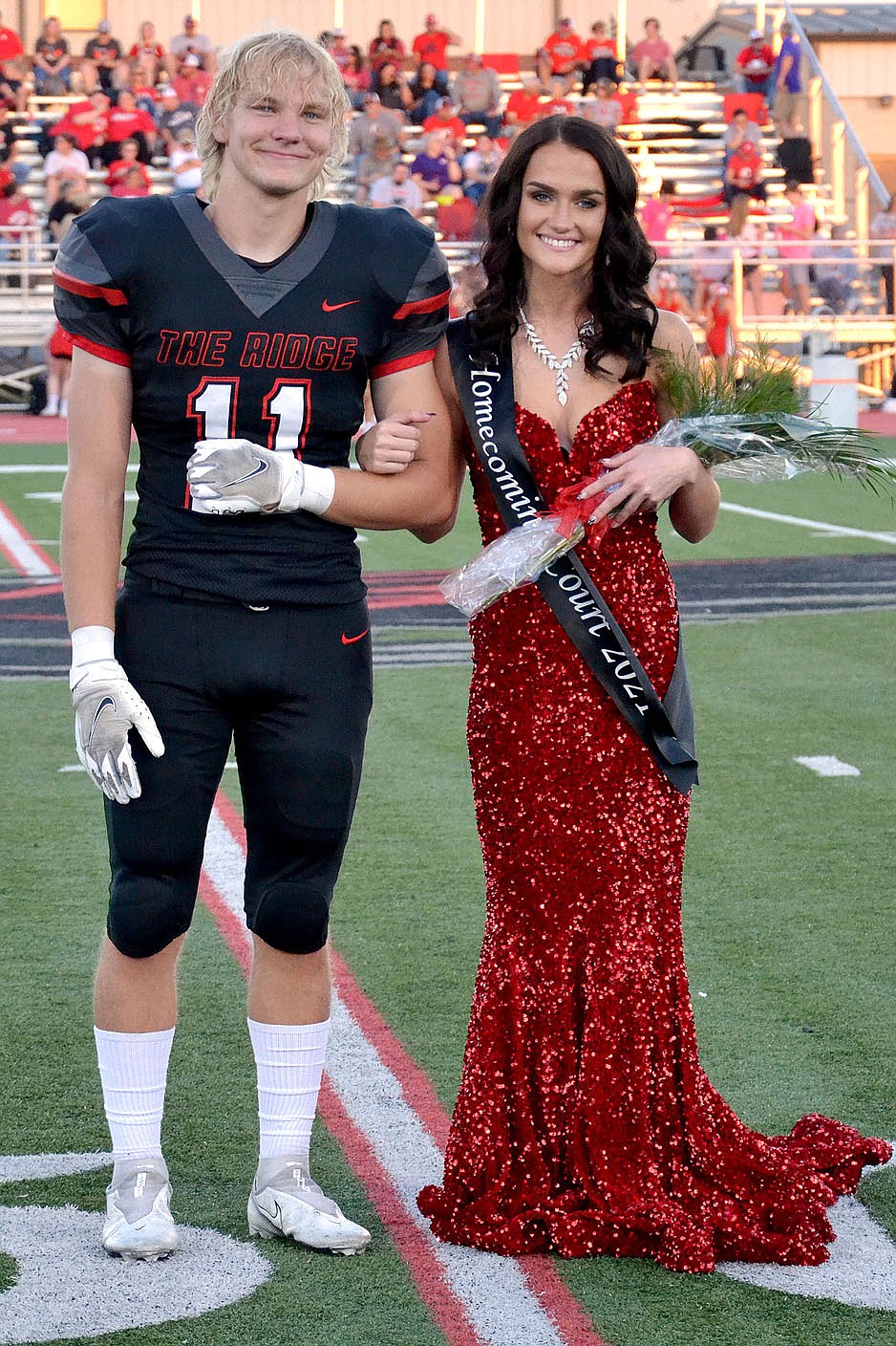 Homecoming maid Paige Brown, 17, daughter of Aimee Yager and Adam Yager, was escorted by Will Anderson.
