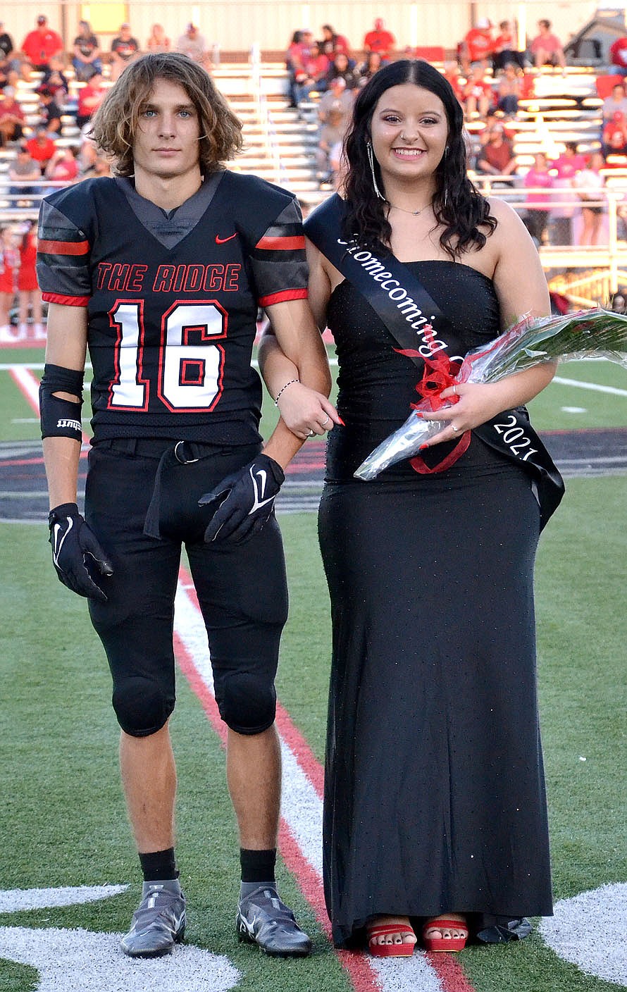 Homecoming maid Masie Foltz, 17, daughter of Kayla and Wes Anderson and A.J. Foltz, was escorted by Caleb Neil.