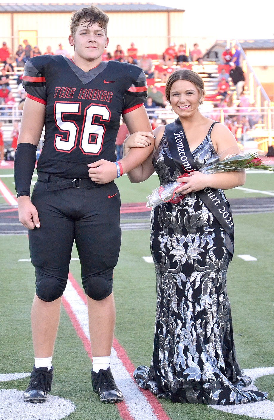 Homecoming maid Nalea Holliday, 17, daughter of Nash and Candice Holliday, was escorted by Braidon McCarley.