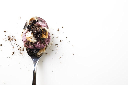 This image released by Milk Street shows a recipe for Eton Mess with Chocolate and Cherries. (Milk Street via AP)