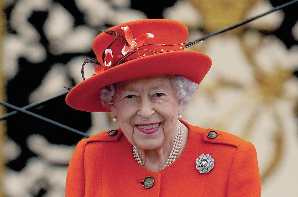Britain's Queen Elizabeth II attends the Birmingham 2022 Commonwealth Games Queen's Baton Relay event outside Buckingham Palace in London, Thursday, Oct. 7, 2021. The city of Birmingham in England will host the 2022 Commonwealth Games. (AP Photo/Matt Dunham)