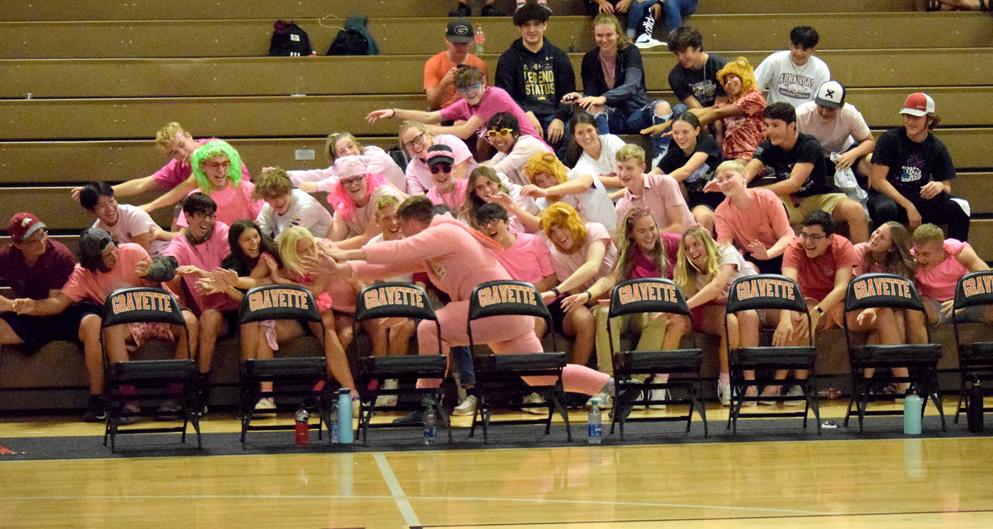 Lion student section rocks the house during volleyball match