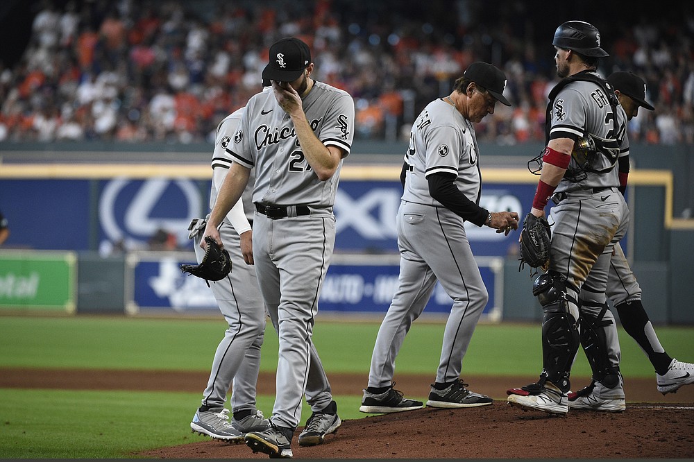 Chicago White Sox starting pitcher Lucas Giolito (27) is pulled from the game during the fifth inning in Game 2 of a baseball American League Division Series against the Houston Astros, Friday, Oct. 8, 2021, in Houston. (AP Photo/Eric Christian Smith)
