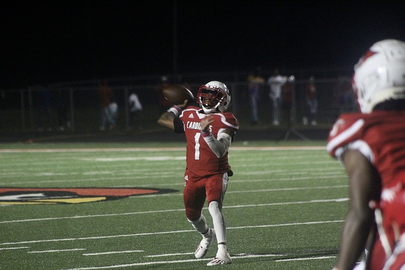 Photo By: Patric Flannigan
Martavius Thomas looks downfield for a pass to Jarvis Reed during the fourth quarter of Camden Fairview’s game against Magnolia. The classmates were a threat to the Panther defense throughout the night.