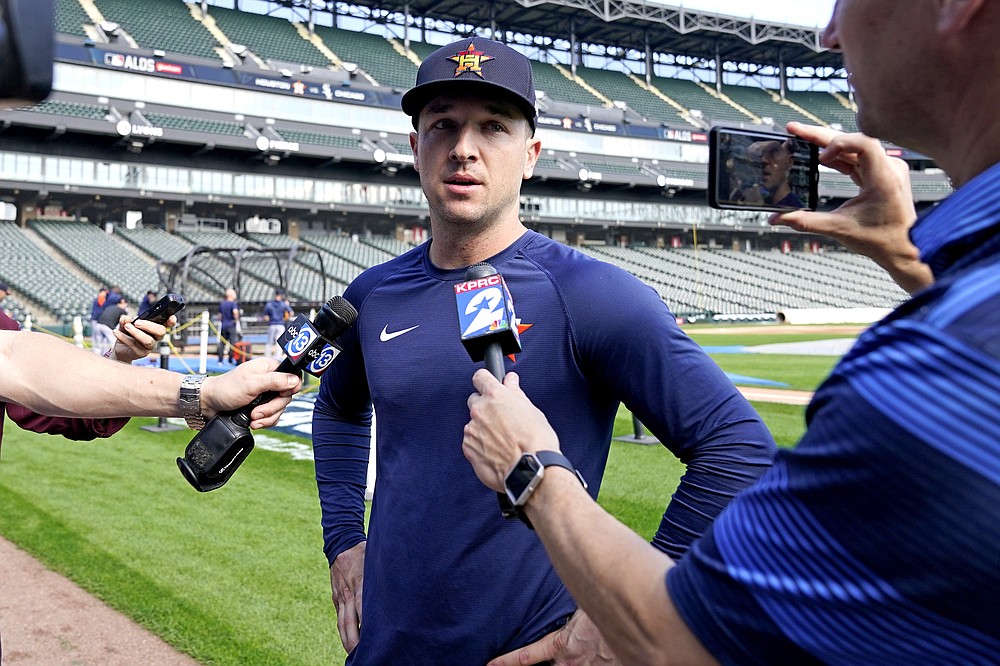 Houston Astros' Alex Bregman talks to media members during baseball practice for the American League Division Series, Saturday, Oct. 9, 2021, in Chicago. The Chicago White Sox host the Astros in Game 3 on Sunday. (AP Photo/Nam Y. Huh)