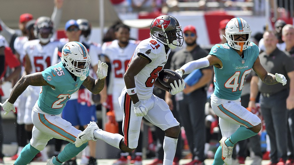 Brady, Brown provide Bucs a boost