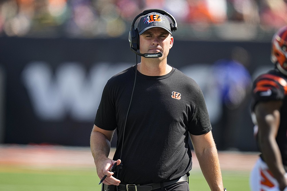 Cincinnati Bengals head coach Zac Taylor paces the sideline in the first half of an NFL football game against the Green Bay Packers in Cincinnati, Sunday, Oct. 10, 2021. (AP Photo/AJ Mast)