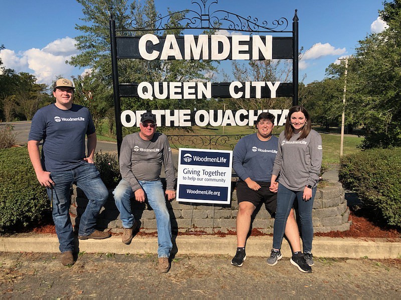 Submitted Photo
Woodmen members Becky Harris, Marc Harris, Tanner Skidmore and Peyton Skidmore recently completed a beautification project of Sandy Beach Park.