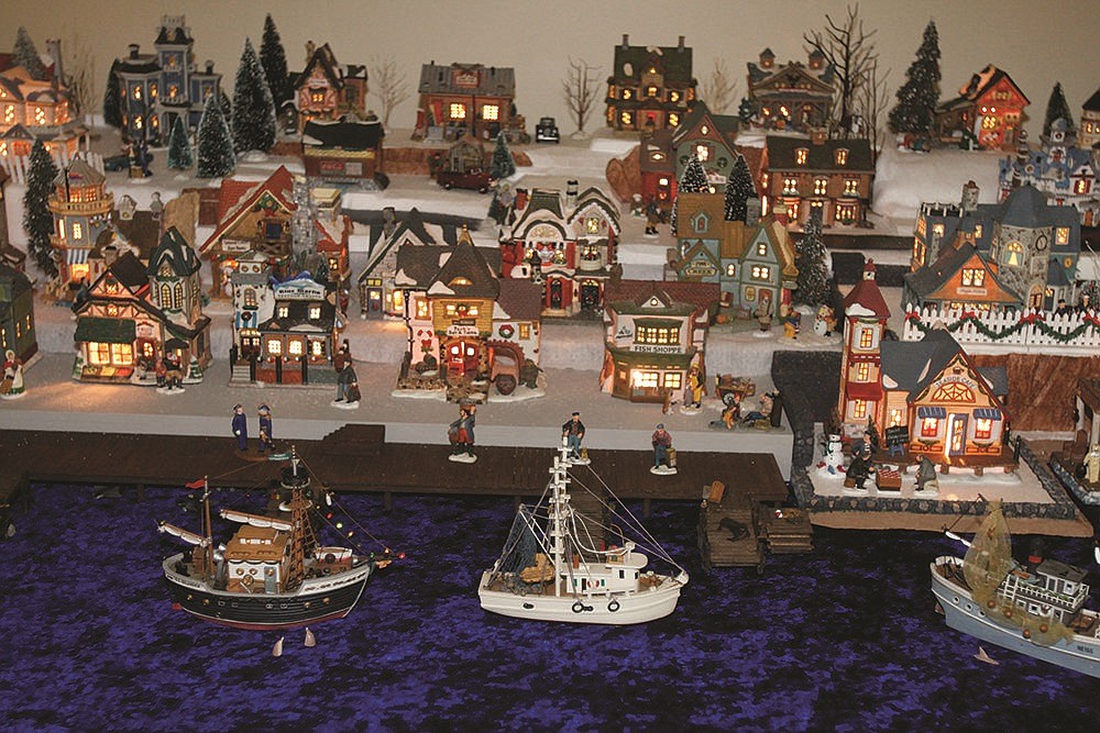 The seaside village of Christmasville features docks made by Paul Smith and fabric that works like water. (Photo from News-Times file)