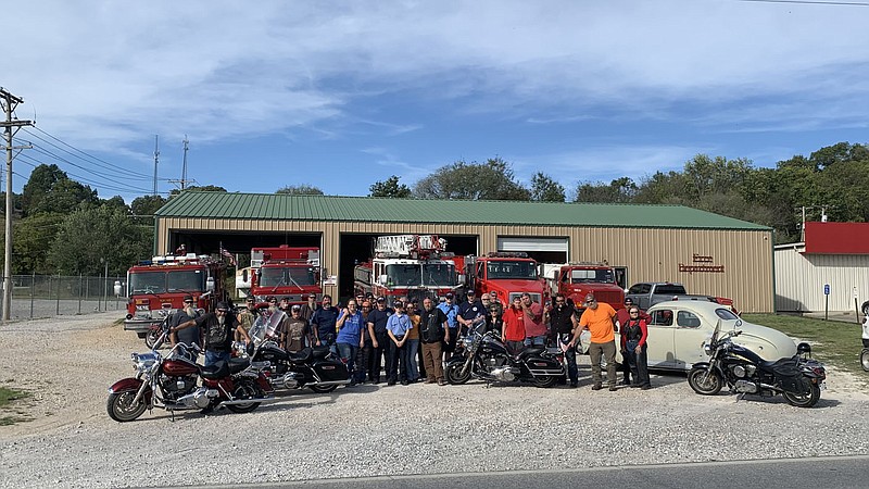 Courtesy photo Participants in the benefit poker run on Saturday gather before taking off from Noel. Business owners and participants contributed to the cause, raising more than $2,200 for the Noel Fire Department and Marshal's Office,