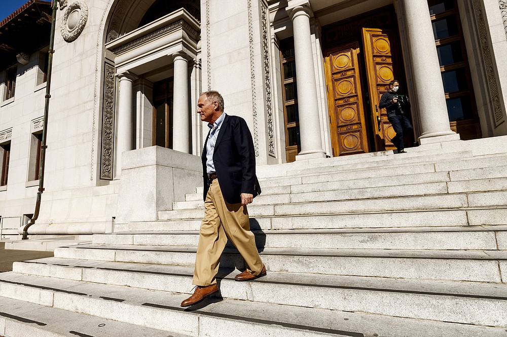 David Card, winner of the 2021 Nobel Prize in economics, walks through University of California, Berkeley campus in Berkeley, Calif., on Monday, Oct. 11, 2021. Card received the award for his research on minimum wages and immigration. (AP Photo/Noah Berger)