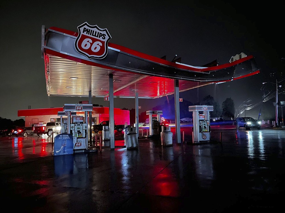 Many spots in Coweta, Okla. took a direct hit from a storm, including a Phillips 66 gas station, Sunday, Oct. 10, 2021. Several reported tornadoes have ripped through Oklahoma, causing damage late Sunday into early Monday morning. (Justin Ayer/Tulsa World via AP)