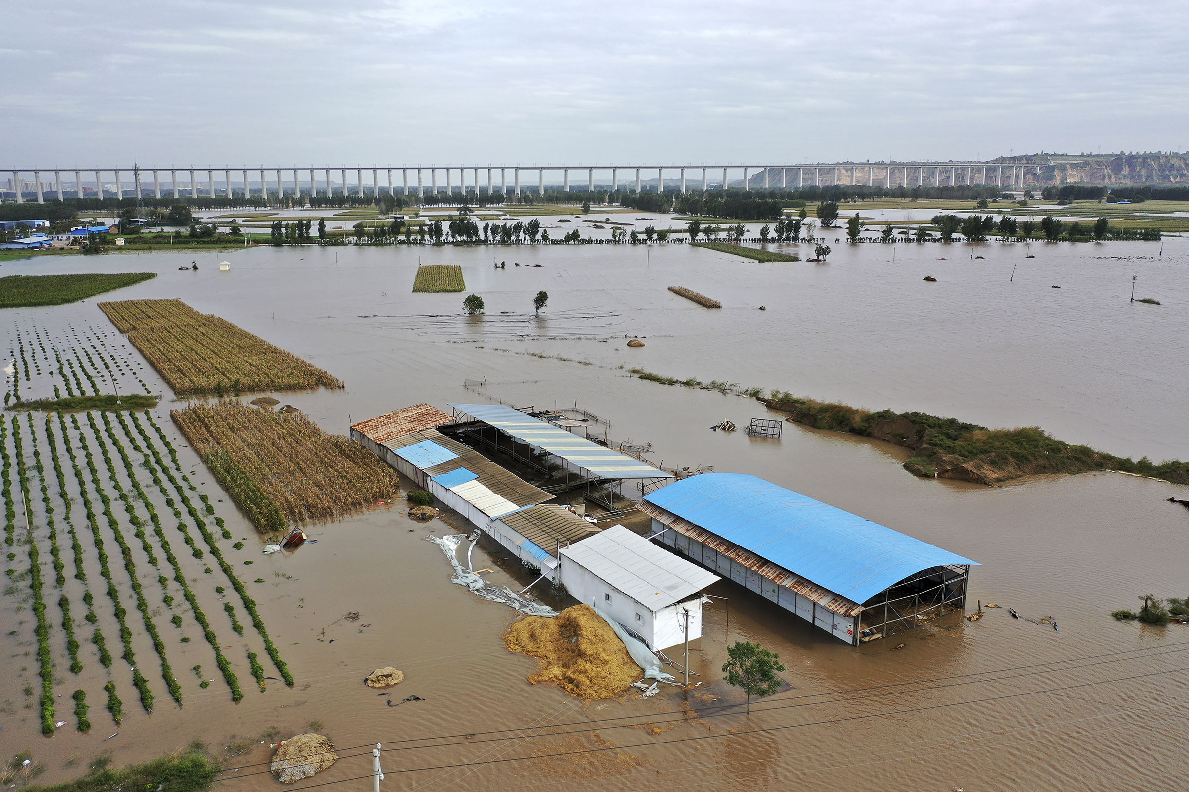 China residents uprooted by floods - Vimarsana News