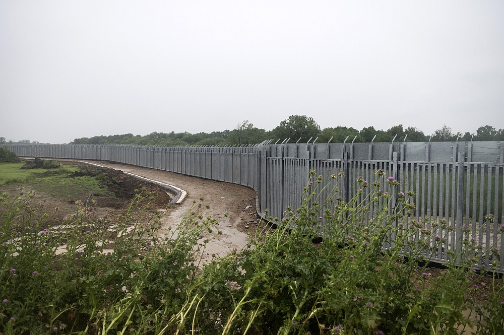 FILE - In this Friday, May 21, 2021 file photo, a view of a steel wall at Evros river, near the village of Poros, at the Greek - Turkish border, Greece. Greece will further increase a border guard at its frontier with Turkey, fearing an upcoming spike in attempted illegal migration, officials said Monday, Oct. 11, 2021. (AP Photo/Giannis Papanikos, File)
