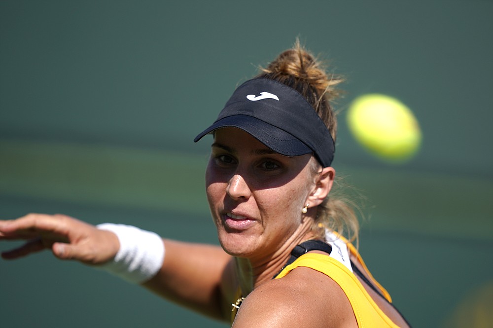 Beatriz Haddad Maia, of Brazil, returns to Karolina Pliskova, of the Czech Republic, at the BNP Paribas Open tennis tournament Monday, Oct. 11, 2021, in Indian Wells, Calif. (AP Photo/Mark J. Terrill)