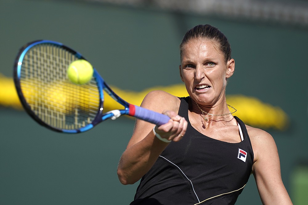 Karolina Pliskova, of the Czech Republic, returns to Beatriz Haddad Maia, of Brazil, at the BNP Paribas Open tennis tournament Monday, Oct. 11, 2021, in Indian Wells, Calif. (AP Photo/Mark J. Terrill)