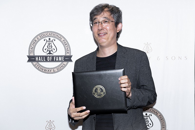 Pianist Naoki Hakutani, a faculty member at the University of Arkansas at Little Rock, has been inducted into the Astoria, N.Y.-based Steinway & Sons Teacher Hall of Fame. (Special to the Democrat-Gazette)