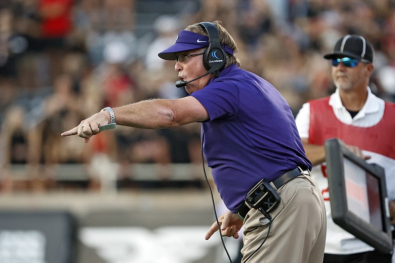 TCU coach Gary Patterson yells out to his players during the first half of an NCAA college football game against Texas Tech, Saturday, Oct. 9, 2021, in Lubbock, Texas. (AP Photo/Brad Tollefson)
