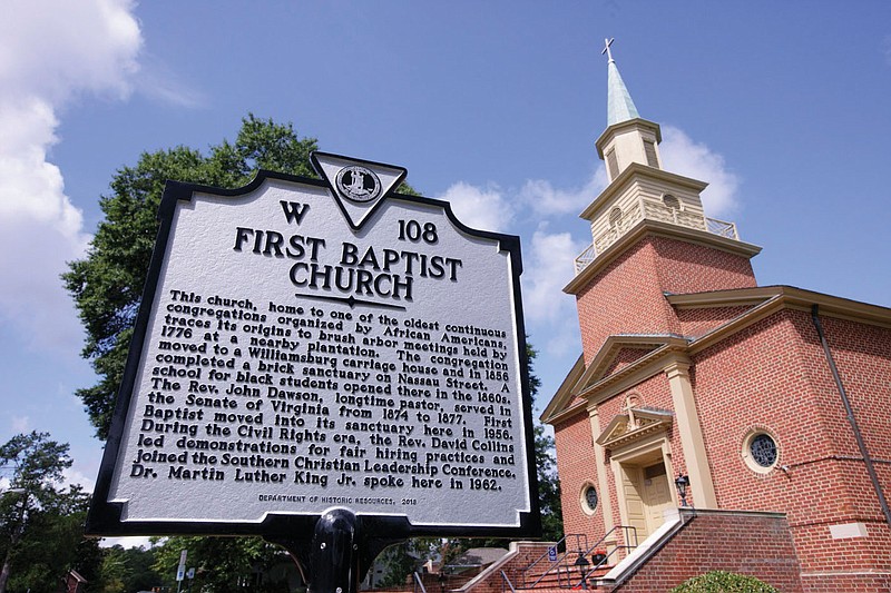 This a photo of a historical marker in front of a historic Baptist church in Williamsburg, Va.

A sign in Williamsburg commemorates the original First Baptist Church. MUST CREDIT: Photo for The Washington Post by Timothy C. Wright