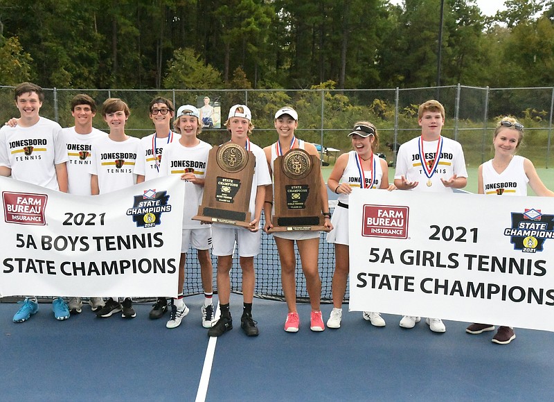 Jonesboro's boys and girls teams both claimed their fifth-straight Class 5A state tennis title Tuesday at Lakeside. - Photo by Tanner Newton of The Sentinel-Record