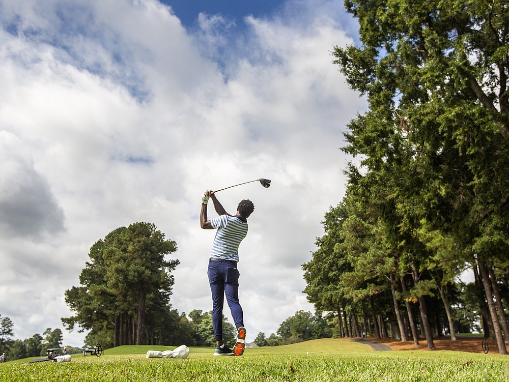 North Carolina A&T's J.R. Smith drives from the sixth tee during the second round of the Phoenix Invitational golf tournament in Burlington, N.C., Tuesday, Oct. 12, 2021. Smith spent 16 years playing in the NBA, winning two world championships. (Woody Marshall/News & Record via AP)