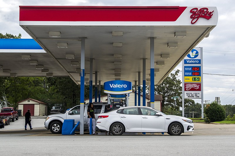 People get gas at a gas station on Fair Park on Tuesday, Oct. 12, 2021.

(Arkansas Democrat-Gazette/Stephen Swofford)