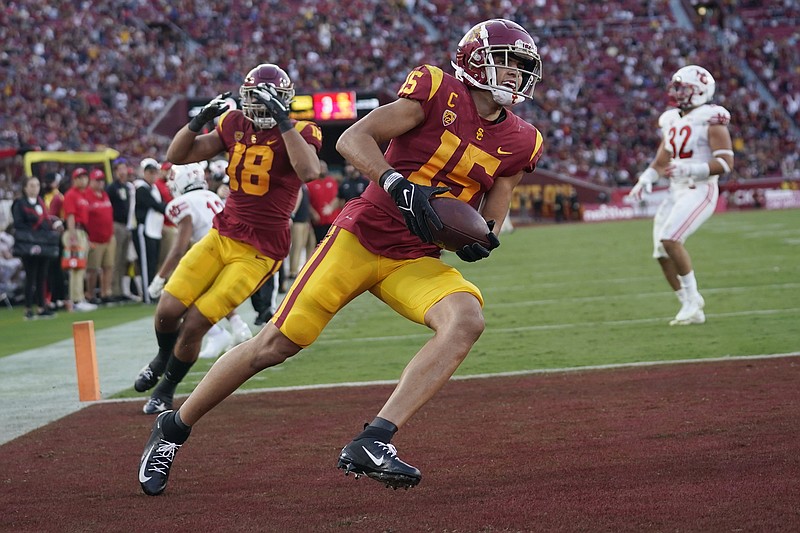 Southern California wide receiver Drake London (15) celebrates his touchdown catch during the first half of an NCAA college football game against Utah, Saturday, Oct. 9, 2021, in Los Angeles. (AP Photo/Marcio Jose Sanchez)