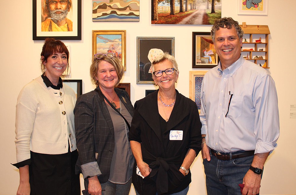 Robin Atkinson (from left); Jannie Hulen; Kathy Thompson, &quot;Our Art, Our Region, Our Time&quot; director and curator; and Craig Underwood gather at the opening reception for the Walton Arts Center's inaugural regional art exhibition.
(NWA Democrat-Gazette/Carin Schoppmeyer)