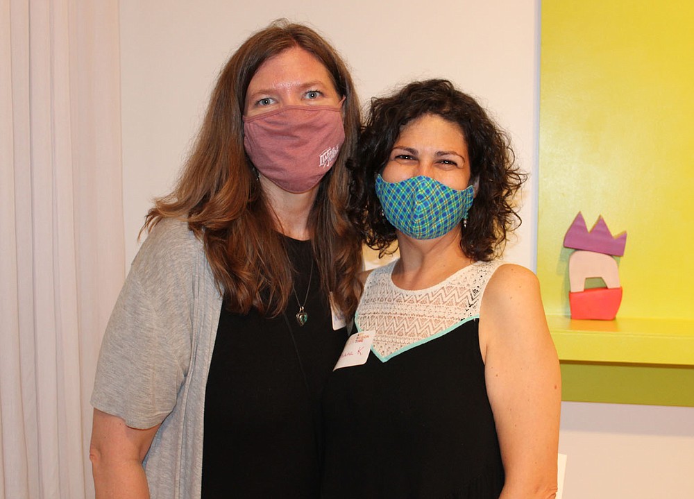 Michelle Parks (left) and Shana Kasparek stand for a photo Sept. 30 at the Walton Arts Center.
(NWA Democrat-Gazette/Carin Schoppmeyer)