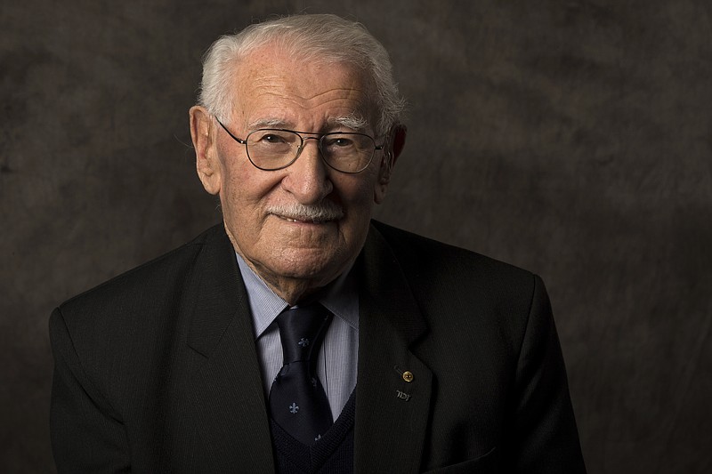 In this undated photo provided by the Sydney Jewish Museum, Holocaust survivor Eddie Jaku poses for a photograph in Sydney, Australia. Jaku, who last year published his best-selling memoir, &#x201c;The Happiest Man on Earth,&#x201d; has died in Sydney, a Jewish community leader said. He was 101. (Sydney Jewish Museum via AP)