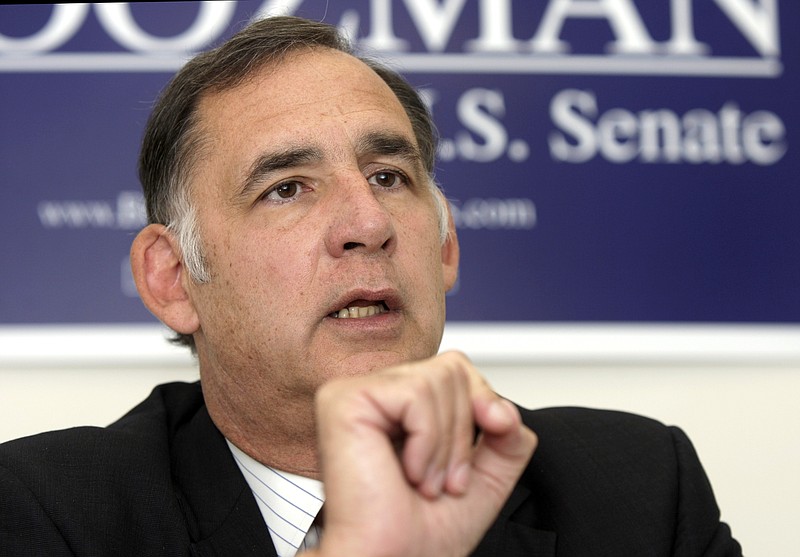 FILE - In this Oct. 14, 2010 file photo, then-Arkansas Republican Senate candidate, Rep. John Boozman is interviewed at his campaign headquarters in Little Rock, Ark. Republican Sen. John Boozman's campaign said Wednesday, Oct. 13, 2021, it's raised more than $1.1 million over the past three months for his reelection bid. The campaign for the two-term senator from Arkansas said it has more than $2.7 million cash on hand. Friday is the deadline for campaigns to file their quarterly reports with the Federal Election Commission. (AP Photo/Danny Johnston, File)