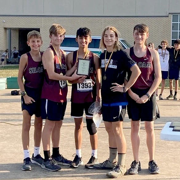 Photo submitted
The Siloam Springs junior high boys cross country team placed second Tuesday at the Prairie Grove Tigers Invitational. Pictured are (from left): Bennett Naustvic, Chance Cunningham, Diego Palacio-Castillo, Sterling Maples and Jacob Seauve.