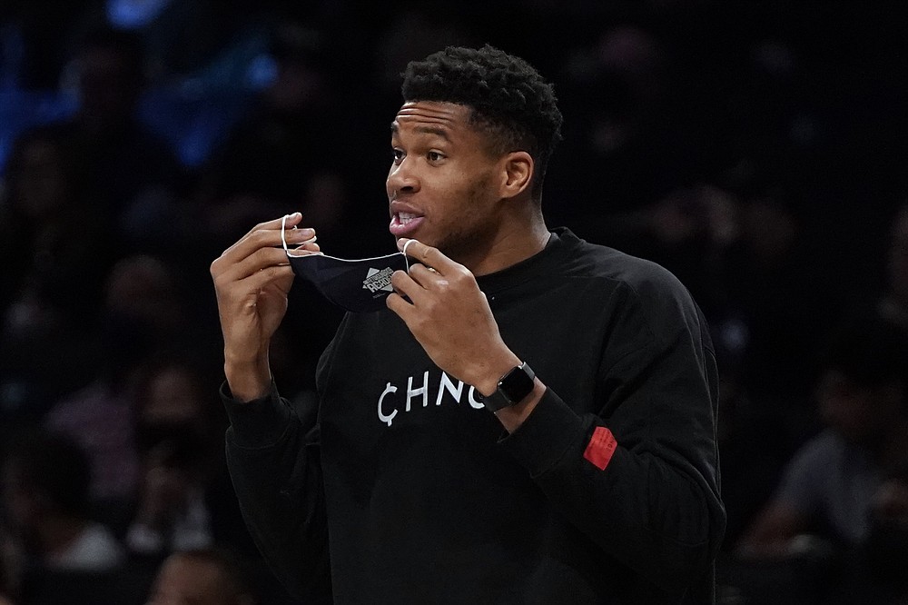 Milwaukee Bucks' Giannis Antetokounmpo calls out to his teammates during the first half of a preseason NBA basketball game against the Brooklyn Nets on Friday, Oct. 8, 2021, in New York. (AP Photo/Frank Franklin II)