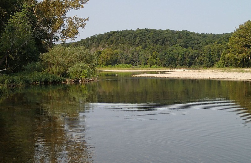 Fall is quiet time on the Elk River near Pineville, Mo. Summer crowds of floaters are gone, but the water is warm and the smallmouth bass fishing is good as the leaves begin to show autumn color.
(NWA Democrat-Gazette/Flip Putthoff)